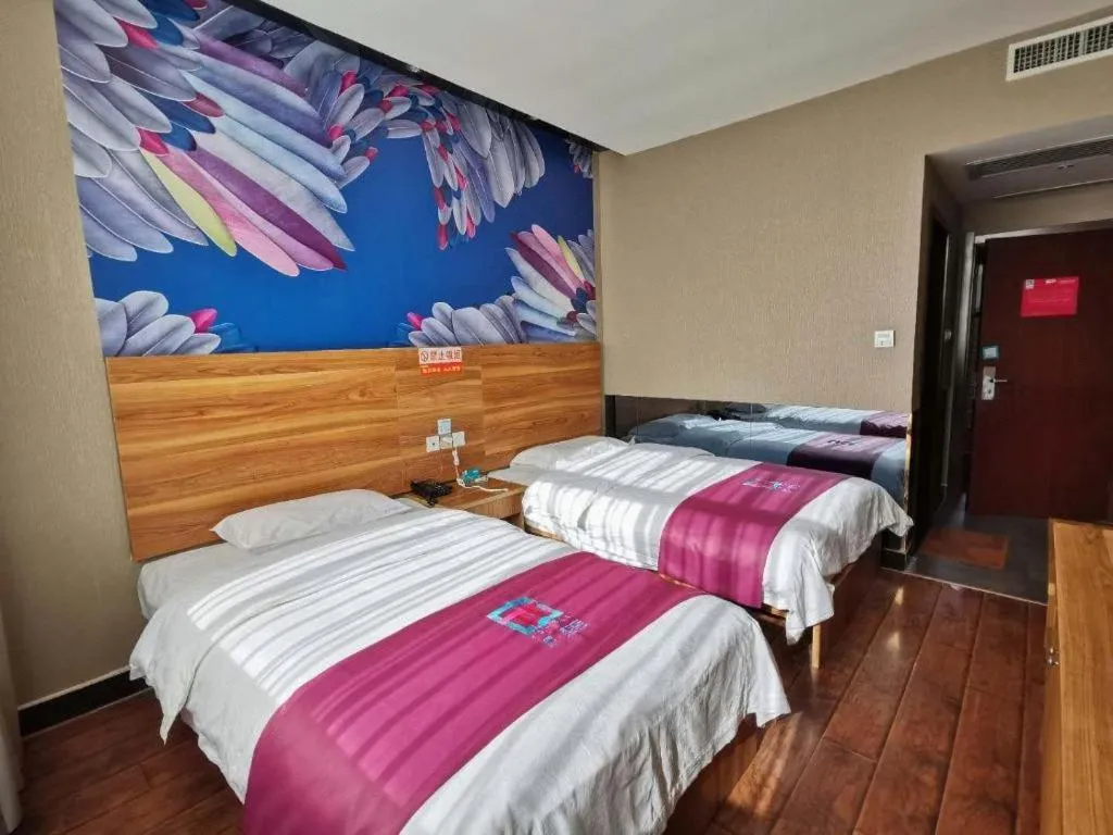 Bed in PAI Hotel Huayin Huashan Mountain Scenic Spot Ancient Street