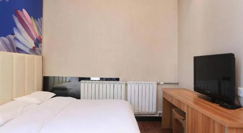 Bed in PAI Hotel Huayin Huashan Mountain Scenic Spot Ancient Street