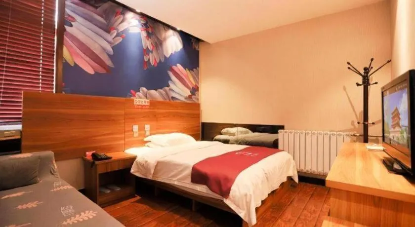 Bed in PAI Hotel Huayin Huashan Mountain Scenic Spot Ancient Street