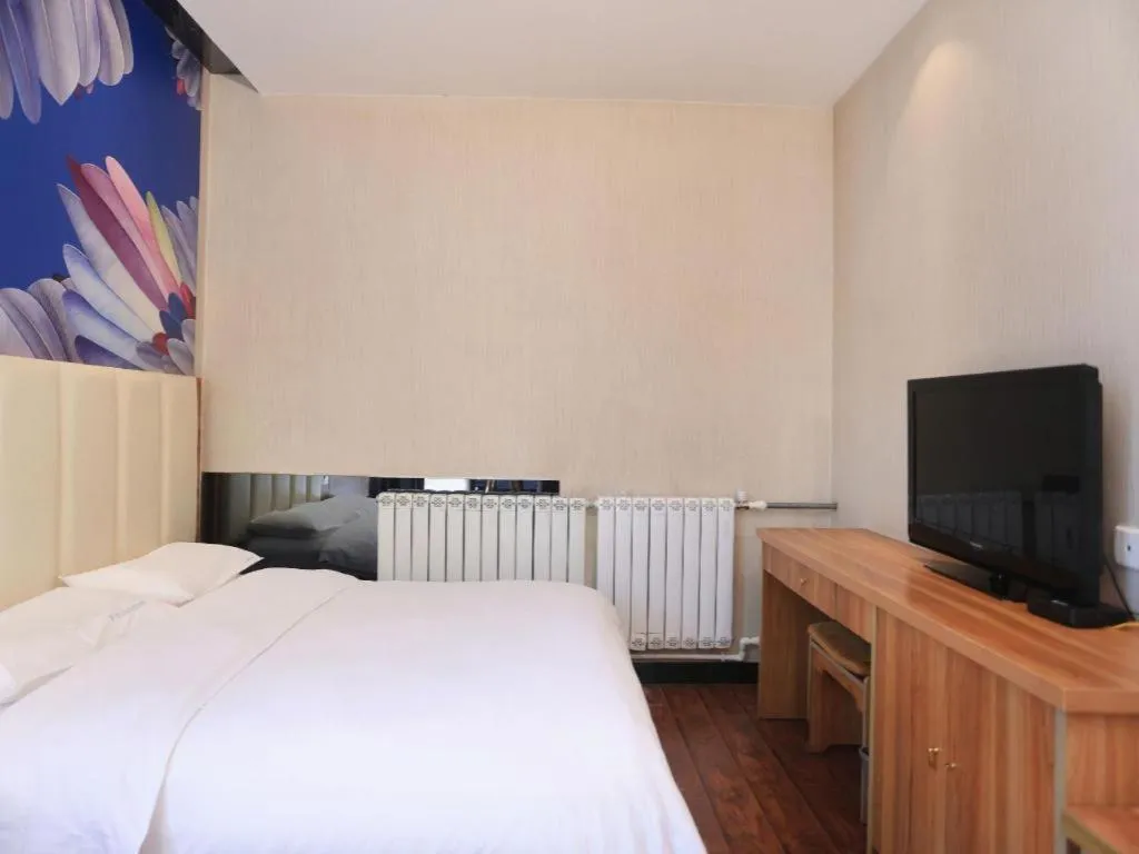 Bed in PAI Hotel Huayin Huashan Mountain Scenic Spot Ancient Street