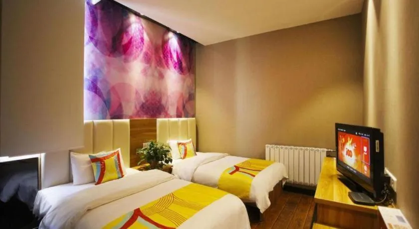 Bed in PAI Hotel Huayin Huashan Mountain Scenic Spot Ancient Street