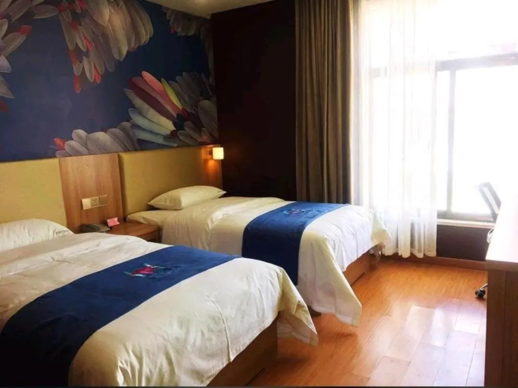 Bed in PAI Hotel Huayin Huashan Mountain Scenic Spot Ancient Street