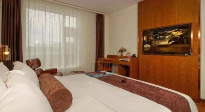 Bed in James Joyce Coffetel·Chadianzi Passenger Terminal Jinke Bei Road Metro Station