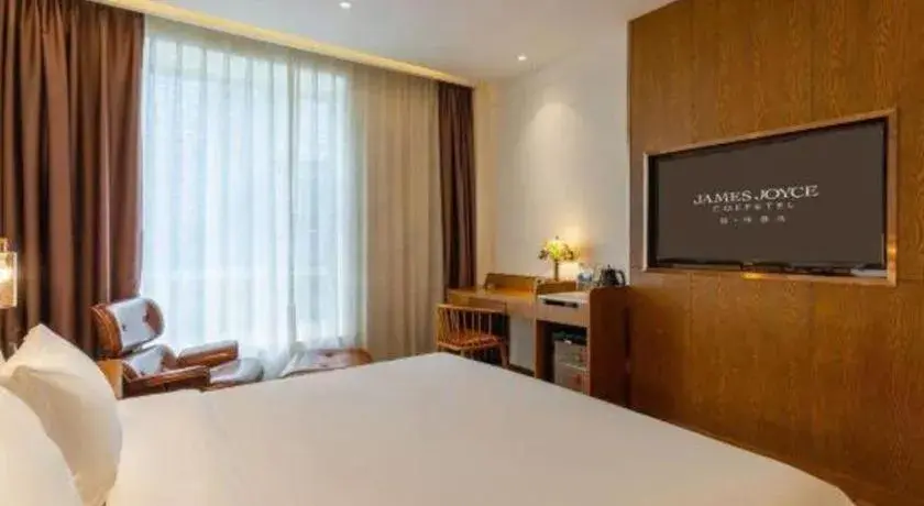 Bed in James Joyce Coffetel·Chadianzi Passenger Terminal Jinke Bei Road Metro Station Bed in James Joyce Coffetel·Chadianzi Passenger Terminal Jinke Bei Road Metro Station