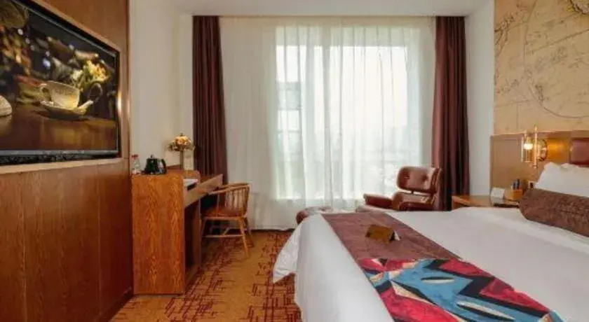 Bed in James Joyce Coffetel·Chadianzi Passenger Terminal Jinke Bei Road Metro Station Bed in James Joyce Coffetel·Chadianzi Passenger Terminal Jinke Bei Road Metro Station