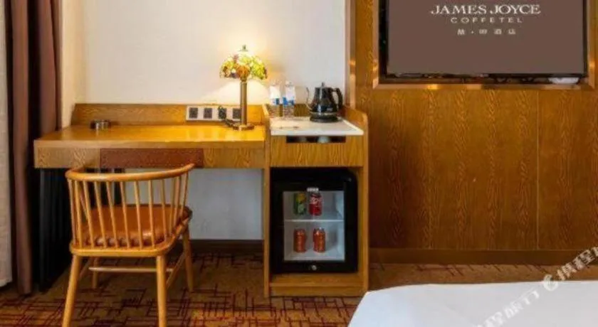 Bed in James Joyce Coffetel·Chadianzi Passenger Terminal Jinke Bei Road Metro Station