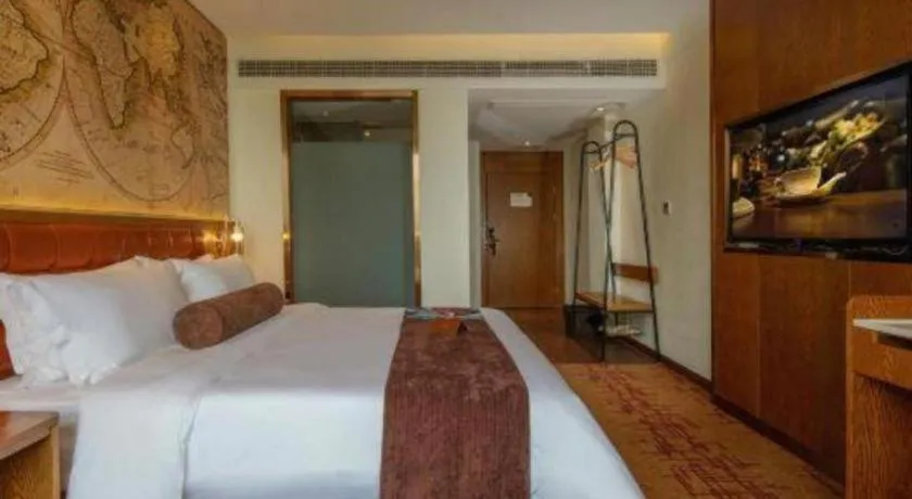 Bed in James Joyce Coffetel·Chadianzi Passenger Terminal Jinke Bei Road Metro Station