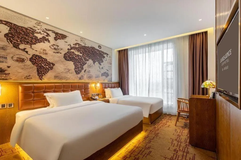 Bed in James Joyce Coffetel·Chadianzi Passenger Terminal Jinke Bei Road Metro Station