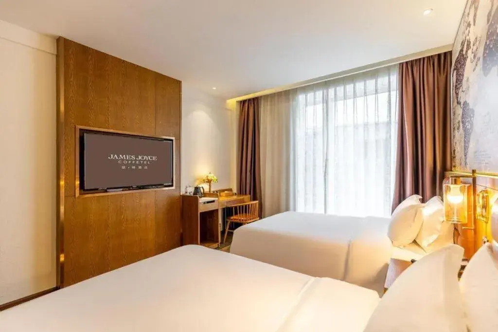 Bed in James Joyce Coffetel·Chadianzi Passenger Terminal Jinke Bei Road Metro Station Bed in James Joyce Coffetel·Chadianzi Passenger Terminal Jinke Bei Road Metro Station