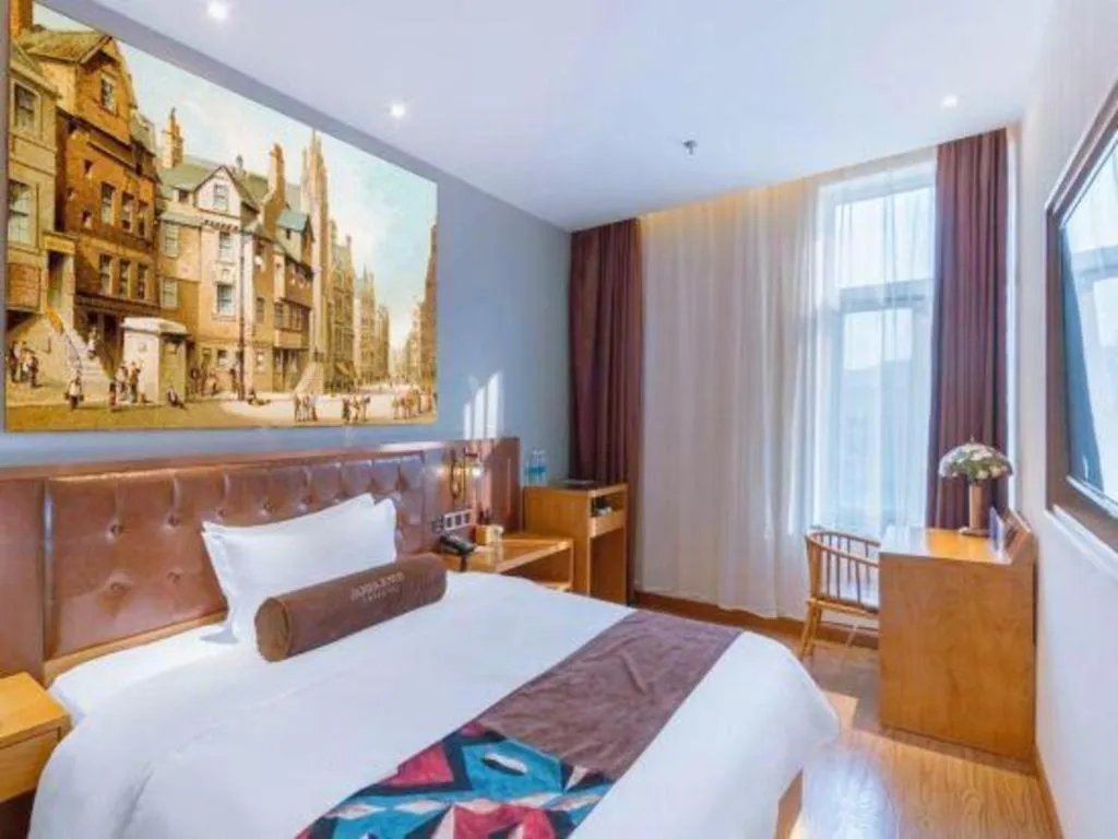 Bed in James Joyce Coffetel Beijing South Station Guang'anmen You'an Hospital