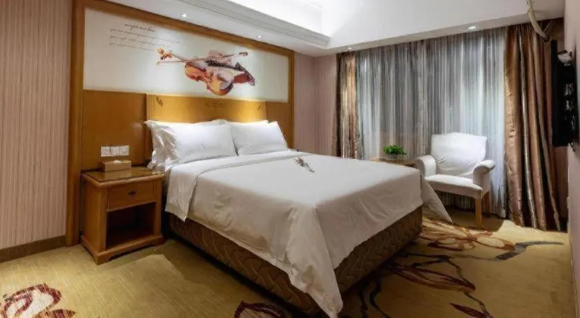 Bed in Vienna Hotel Inner Mongolia Hohhot Railway Station Gongzhufu Metro Station