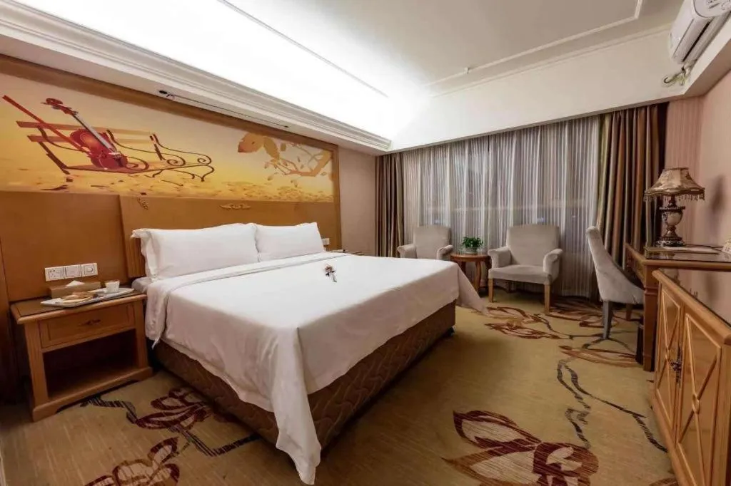 Bed in Vienna Hotel Inner Mongolia Hohhot Railway Station Gongzhufu Metro Station