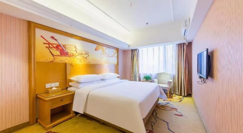 Bed in Vienna Hotel Inner Mongolia Hohhot Railway Station Gongzhufu Metro Station