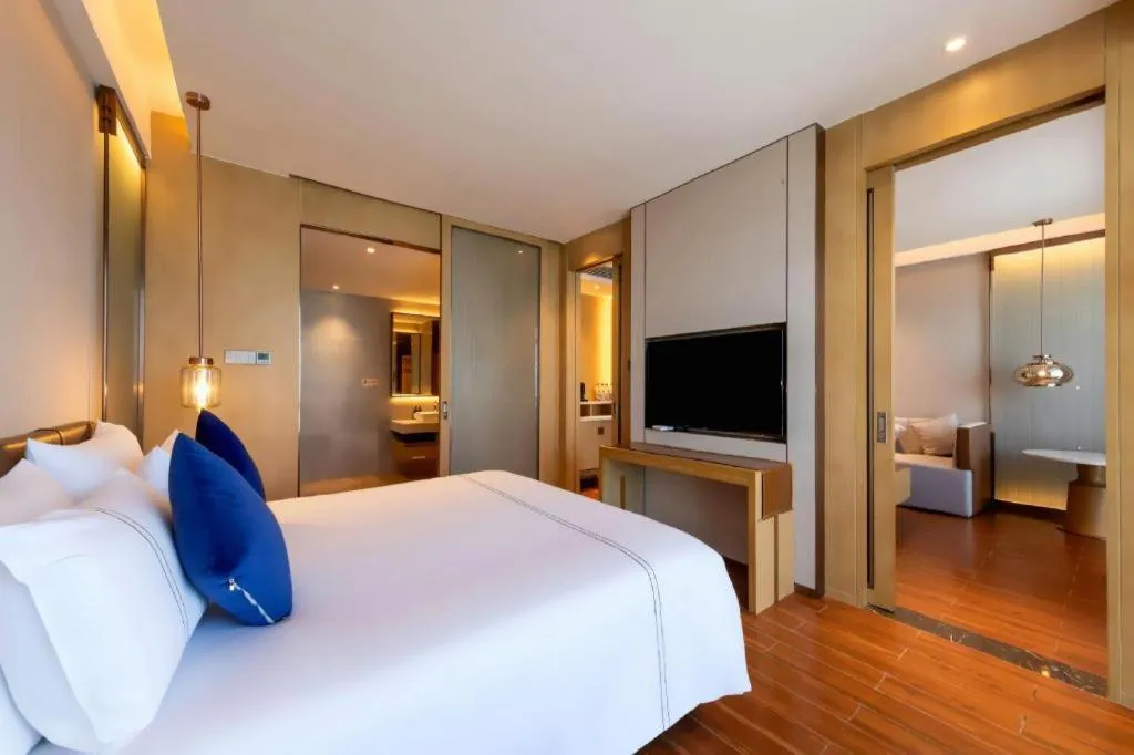 Bed in AUGUSTINE HOTEL