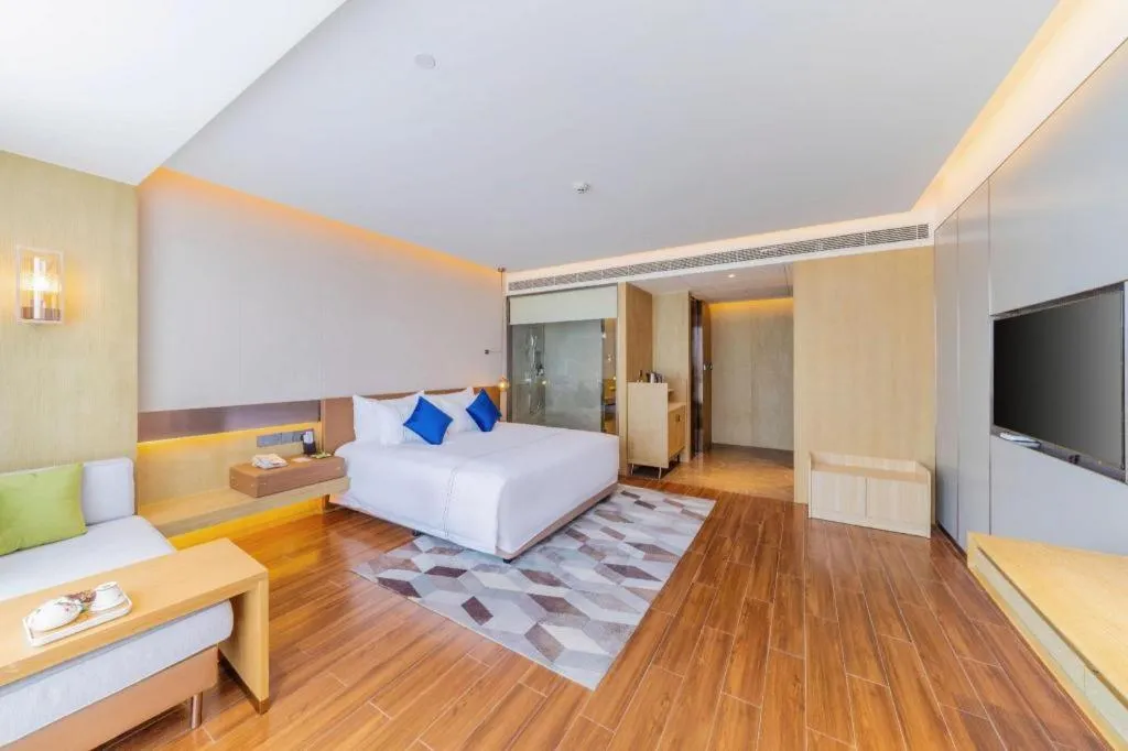 Bed in AUGUSTINE HOTEL