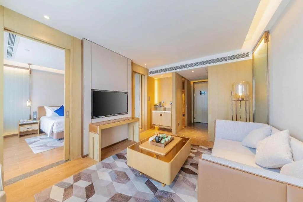 Bed in AUGUSTINE HOTEL