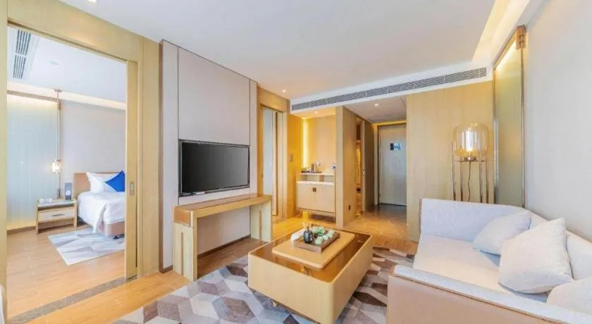 Bed in AUGUSTINE HOTEL