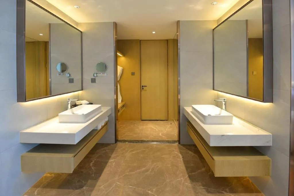 Bed in AUGUSTINE HOTEL