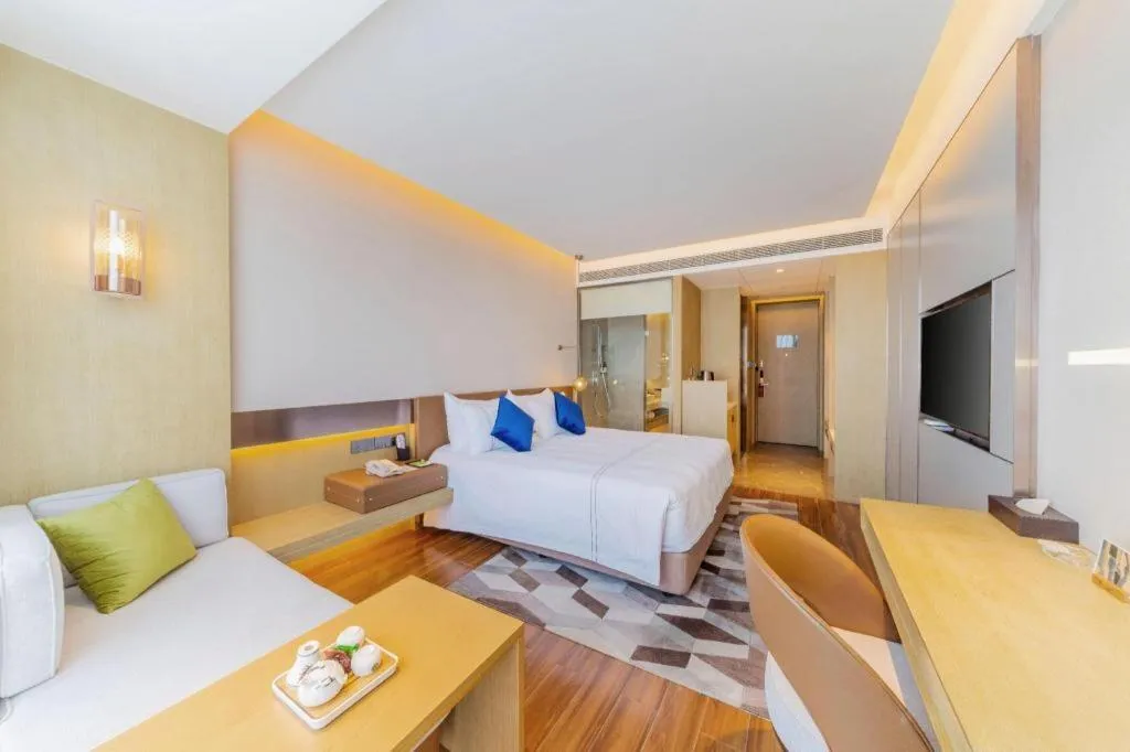 Bed in AUGUSTINE HOTEL