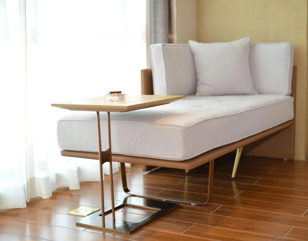 Bed in AUGUSTINE HOTEL