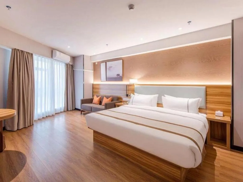 Bed in Jtour Inn Wuxi Meiyuan Kaiyuan Temple Metro