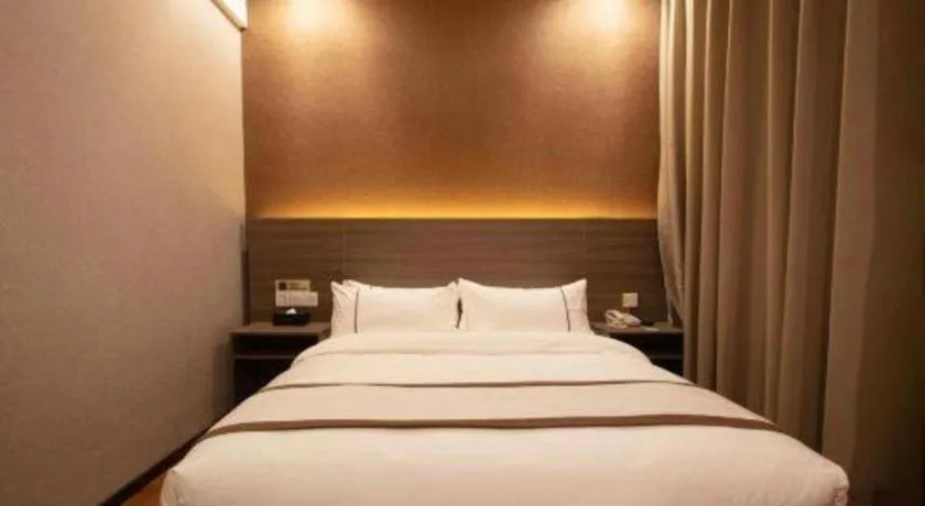 Bed in Jtour Inn Wuxi Meiyuan Kaiyuan Temple Metro