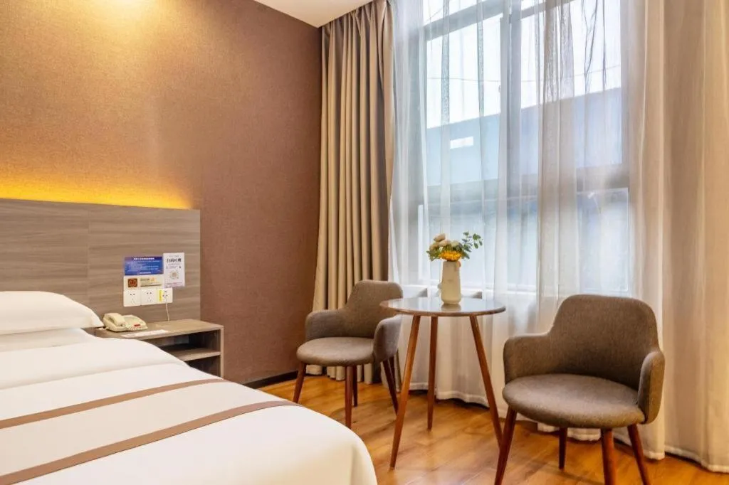 Bed in Jtour Inn Wuxi Meiyuan Kaiyuan Temple Metro