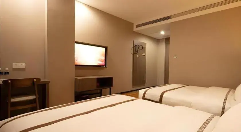 Bed in Jtour Inn Wuxi Meiyuan Kaiyuan Temple Metro Bed in Jtour Inn Wuxi Meiyuan Kaiyuan Temple Metro