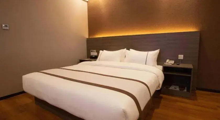 Bed in Jtour Inn Wuxi Meiyuan Kaiyuan Temple Metro Bed in Jtour Inn Wuxi Meiyuan Kaiyuan Temple Metro