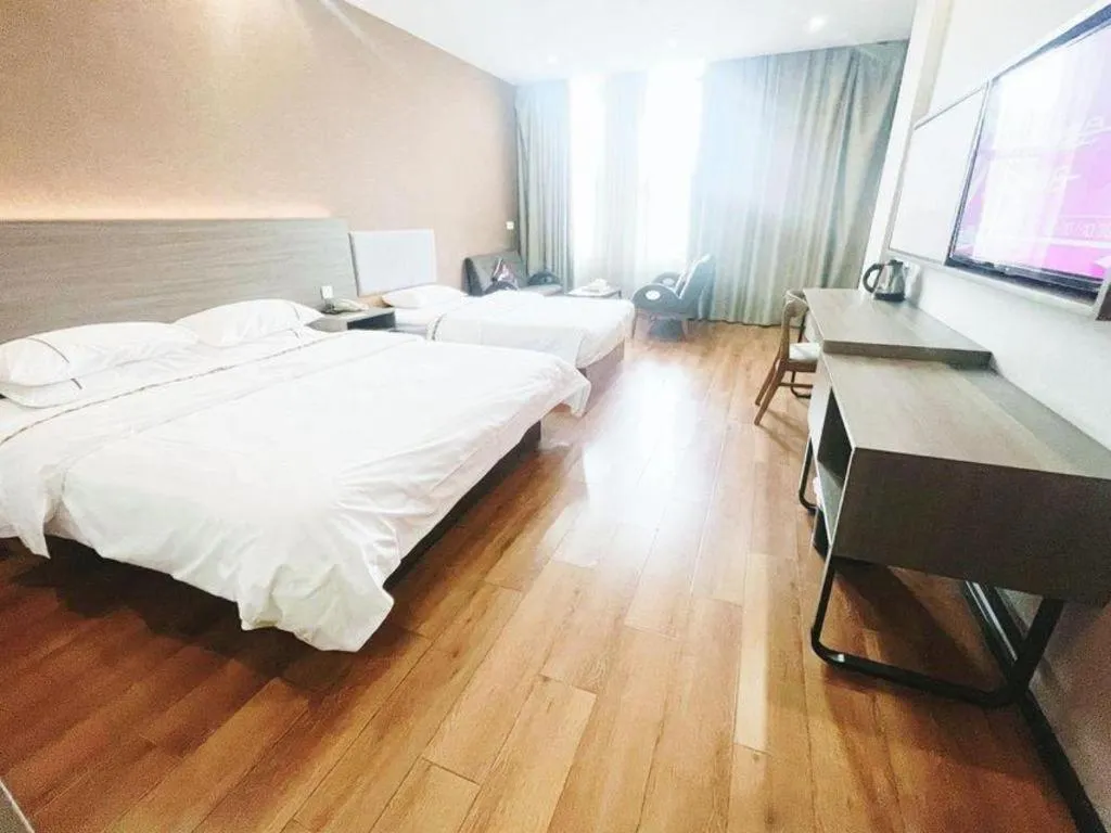 Bed in Jtour Inn Wuxi Meiyuan Kaiyuan Temple Metro