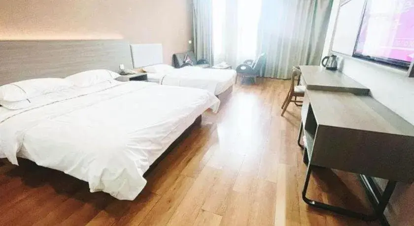 Bed in Jtour Inn Wuxi Meiyuan Kaiyuan Temple Metro Bed in Jtour Inn Wuxi Meiyuan Kaiyuan Temple Metro