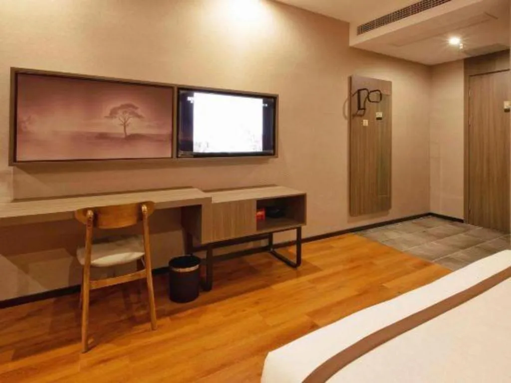 Bed in Jtour Inn Wuxi Meiyuan Kaiyuan Temple Metro