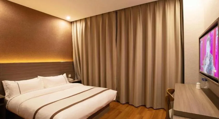 Bed in Jtour Inn Wuxi Meiyuan Kaiyuan Temple Metro