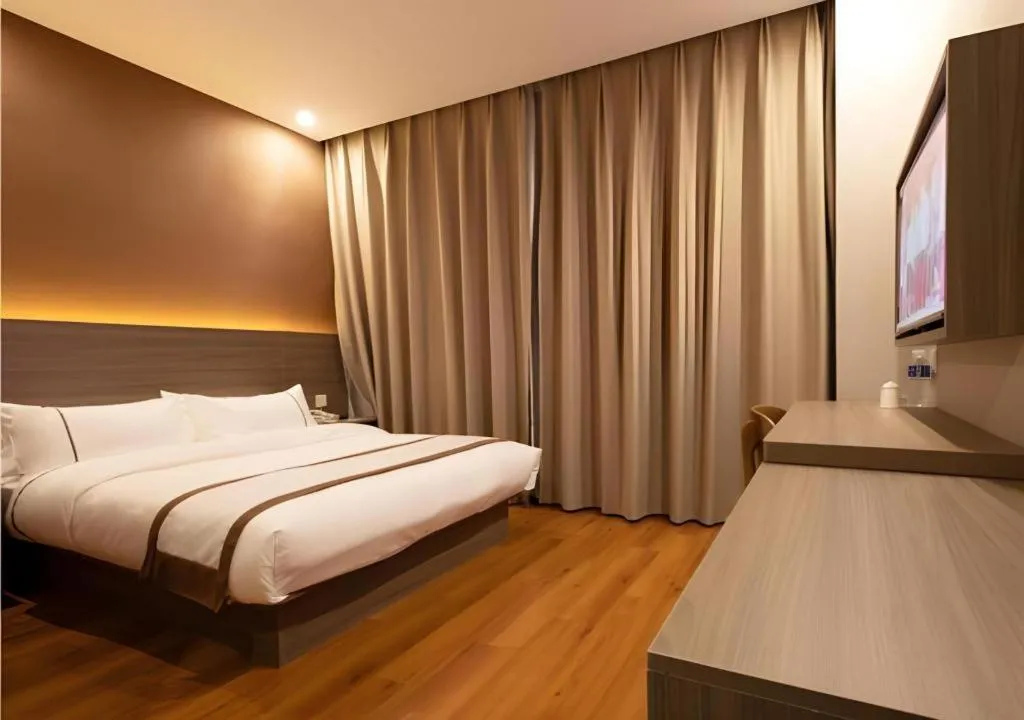 Bed in Jtour Inn Wuxi Meiyuan Kaiyuan Temple Metro