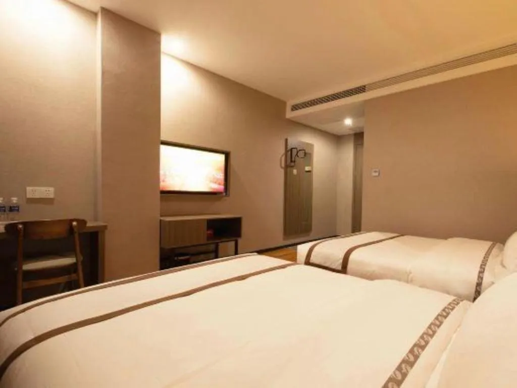 Bed in Jtour Inn Wuxi Meiyuan Kaiyuan Temple Metro