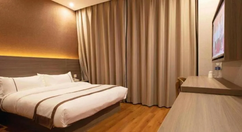 Bed in Jtour Inn Wuxi Meiyuan Kaiyuan Temple Metro