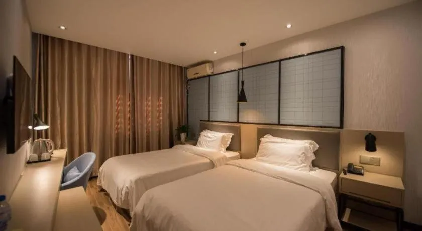 Bed in Borrman Hotel Hefei Guogou Plaza Sanli'an Metro Station