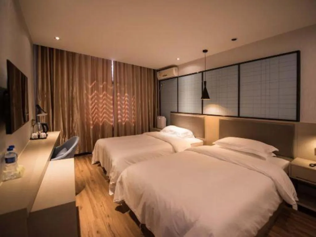 Bed in Borrman Hotel Hefei Guogou Plaza Sanli'an Metro Station