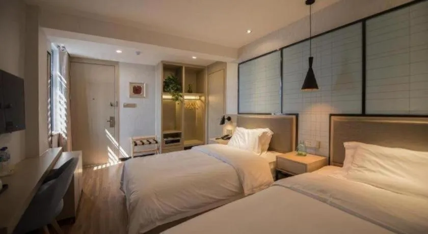 Bed in Borrman Hotel Hefei Guogou Plaza Sanli'an Metro Station