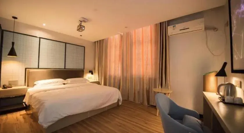 Bed in Borrman Hotel Hefei Guogou Plaza Sanli'an Metro Station Bed in Borrman Hotel Hefei Guogou Plaza Sanli'an Metro Station