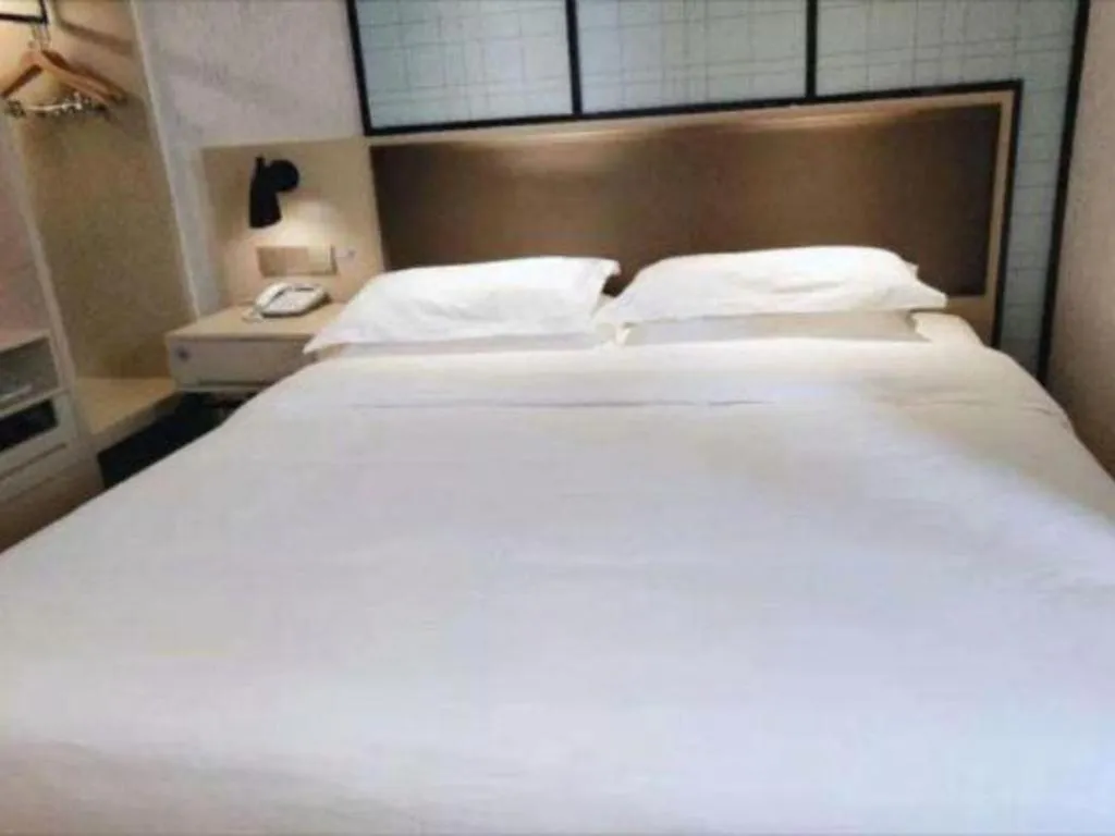 Bed in Borrman Hotel Hefei Guogou Plaza Sanli'an Metro Station