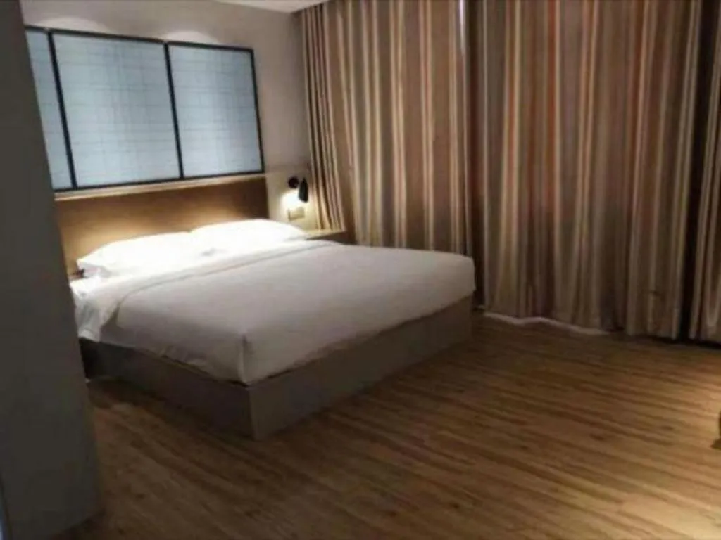 Bed in Borrman Hotel Hefei Guogou Plaza Sanli'an Metro Station