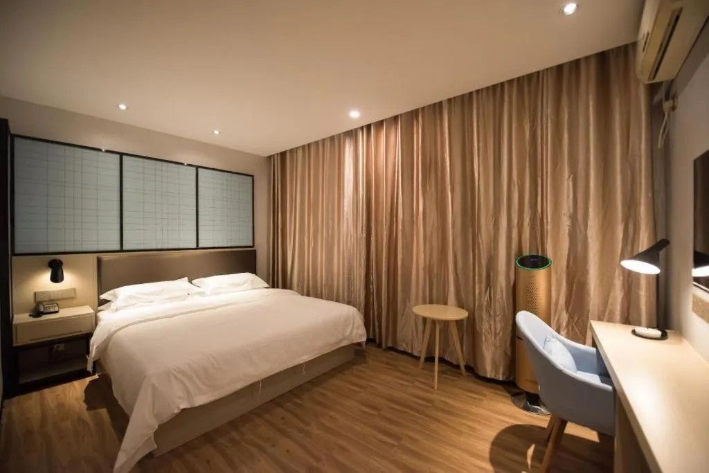 Bed in Borrman Hotel Hefei Guogou Plaza Sanli'an Metro Station