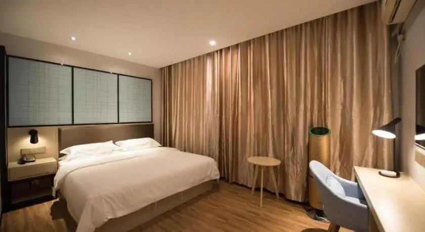 Bed in Borrman Hotel Hefei Guogou Plaza Sanli'an Metro Station Bed in Borrman Hotel Hefei Guogou Plaza Sanli'an Metro Station