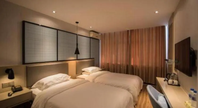 Bed in Borrman Hotel Hefei Guogou Plaza Sanli'an Metro Station