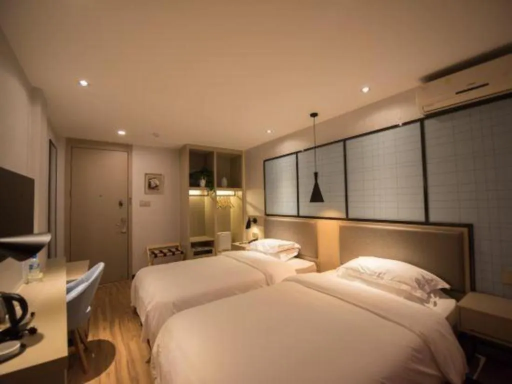 Bed in Borrman Hotel Hefei Guogou Plaza Sanli'an Metro Station