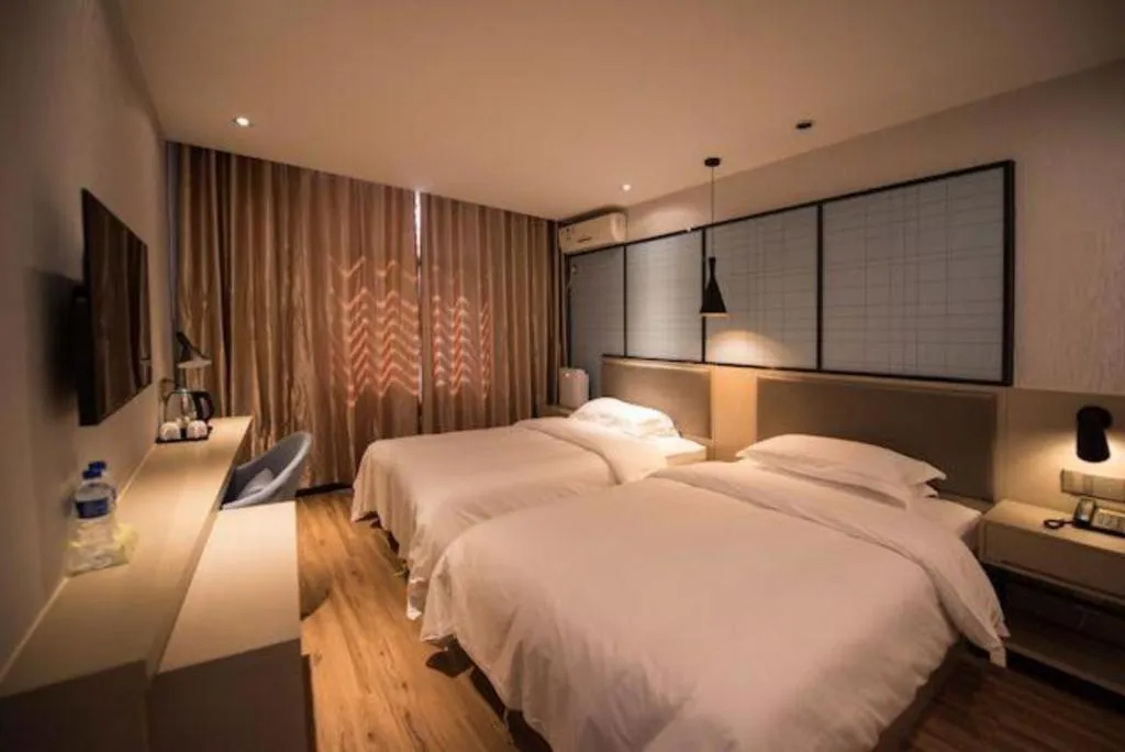 Bed in Borrman Hotel Hefei Guogou Plaza Sanli'an Metro Station