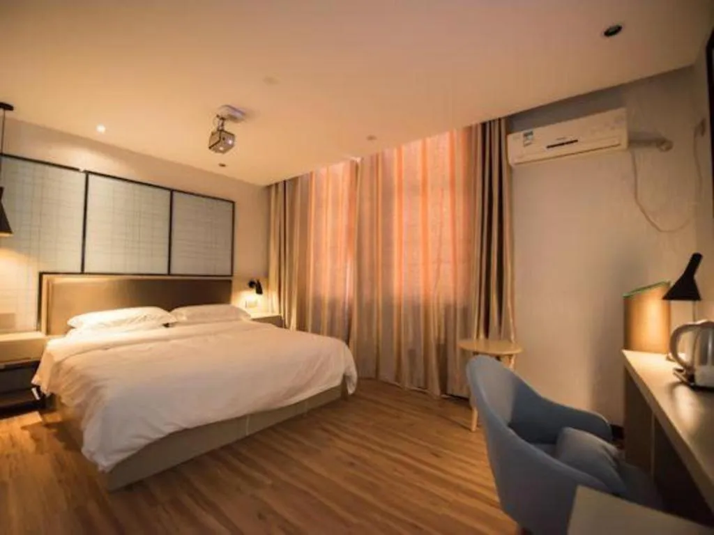 Bed in Borrman Hotel Hefei Guogou Plaza Sanli'an Metro Station