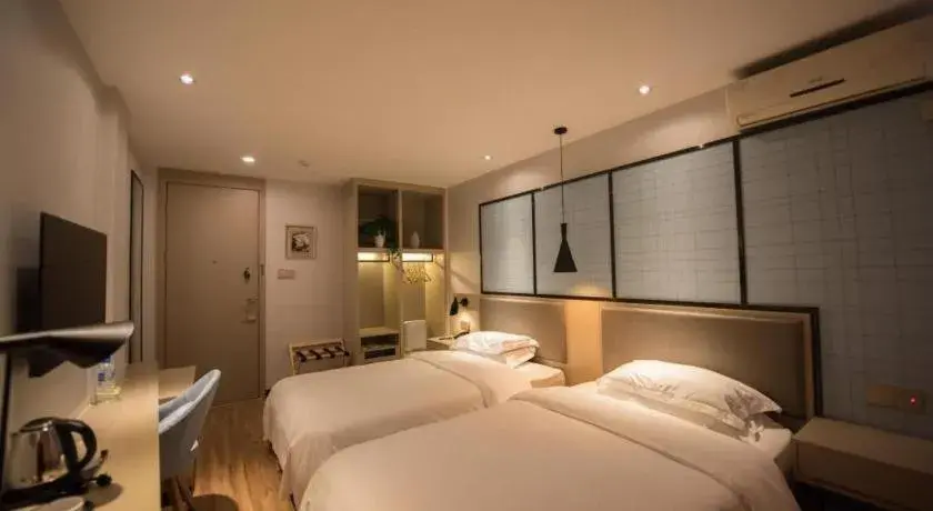 Bed in Borrman Hotel Hefei Guogou Plaza Sanli'an Metro Station Bed in Borrman Hotel Hefei Guogou Plaza Sanli'an Metro Station