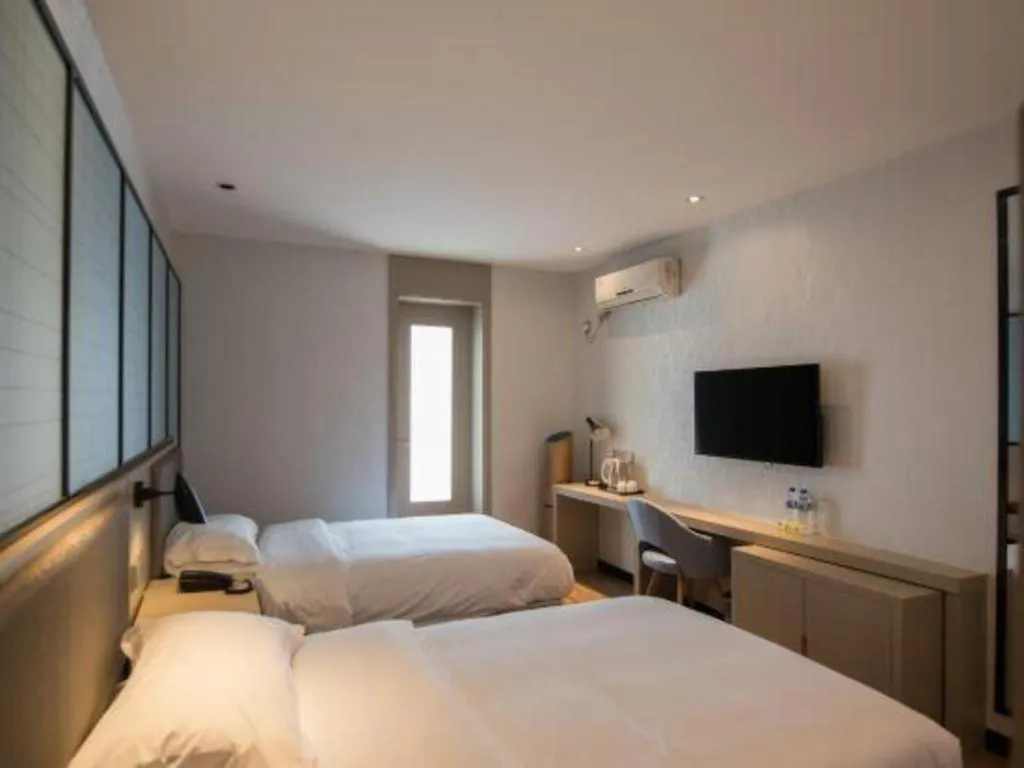 Bed in Borrman Hotel Hefei Guogou Plaza Sanli'an Metro Station